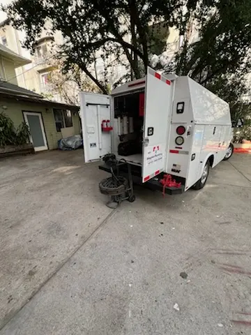 Magnet Plumbing service vehicle on-site for Water Heater Repair in Miami Gardens